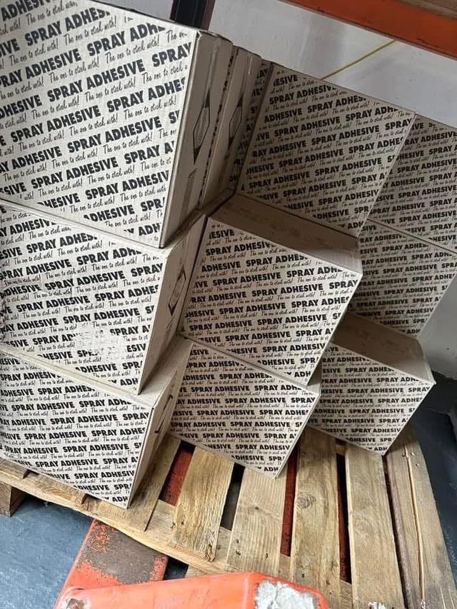 Boxes of spray adhesive in stock at the FloorTradeDirect warehouse, Doncaster