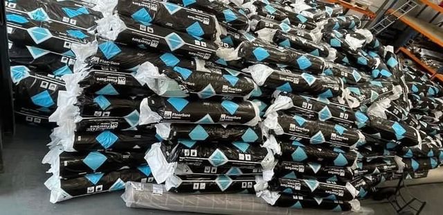 Large stack of underlay rolls in stock at the FloorTradeDirect warehouse, Doncaster